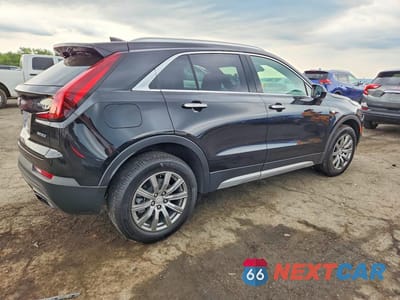 Trzecie zdjęcie samochodu z tyłu: 2019 CADILLAC XT4 PREMIUM LUXURY VIN:1GYFZDR47KF210599 - miniatura