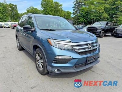 Czwarte zdjęcie samochodu z boku: 2016 HONDA PILOT EXL VIN:5FNYF6H50GB024007 - miniatura