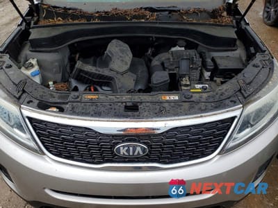 Zdjęcie 12 z 13 samochodu: 2014 KIA SORENTO LX VIN:5XYKT3A62EG485408 - miniatura
