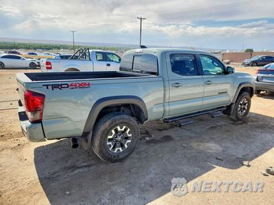 Trzecie zdjęcie samochodu z tyłu: 2023 TOYOTA TACOMA TRD OFF-ROAD VIN:3TYDZ5BN0PT034495 - miniatura