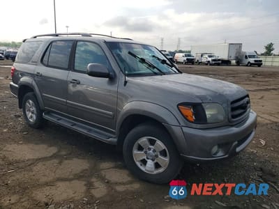 Czwarte zdjęcie samochodu z boku: 2004 TOYOTA SEQUOIA LIMITED VIN:5TDBT48A24S209084 - miniatura