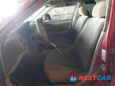 Zdjęcie 7 z 12 samochodu: 2001 TOYOTA COROLLA CE VIN:1NXBR12E91Z457859 - miniatura
