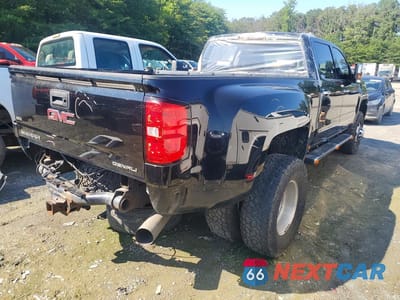Trzecie zdjęcie samochodu z tyłu: 2015 GMC SIERRA K3500 DENALI VIN:1GT424E89FF658150 - miniatura