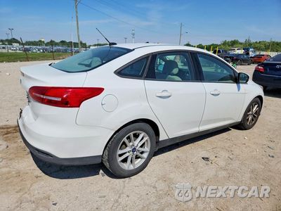 Trzecie zdjęcie samochodu z tyłu: 2018 FORD FOCUS SE VIN:1FADP3F24JL201509 - miniatura