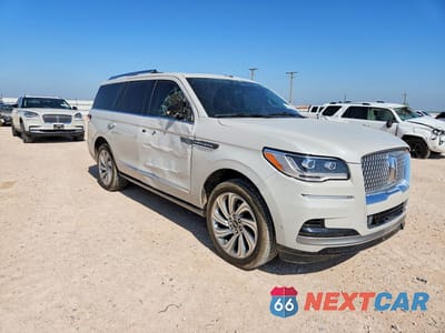 Czwarte zdjęcie samochodu z boku: 2024 LINCOLN NAVIGATOR VIN:5LMJJ2NG4REL23351 - miniatura