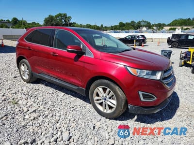 Czwarte zdjęcie samochodu z boku: 2015 FORD EDGE SEL VIN:2FMTK4J90FBC19670 - miniatura