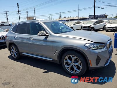 Czwarte zdjęcie samochodu z boku: 2023 BMW X3 XDRIVE30I VIN:5UX53DP08P9R63100 - miniatura