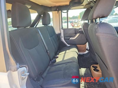 Zdjęcie 10 z 12 samochodu: 2015 JEEP WRANGLER UNLIMITED SAHARA VIN:1C4BJWEG8FL573444 - miniatura