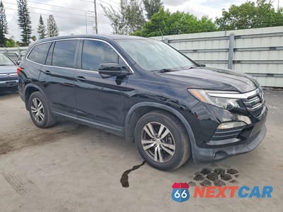 Czwarte zdjęcie samochodu z boku: 2017 HONDA PILOT EXL VIN:5FNYF6H56HB009366 - miniatura