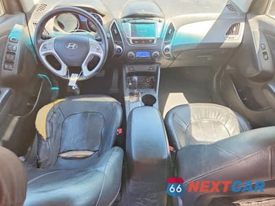 Zdjęcie 8 z 12 samochodu: 2013 HYUNDAI TUCSON LIMITED VIN:KM8JUCAC7DU581428 - miniatura