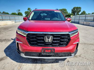 Piąte zdjęcie samochodu w środku: 2024 HONDA PILOT TOURING VIN:5FNYG1H77RB023196 - miniatura