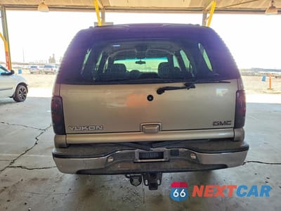 Zdjęcie 6 z 13 samochodu: 2002 GMC YUKON VIN:1GKEC13T22R132849 - miniatura