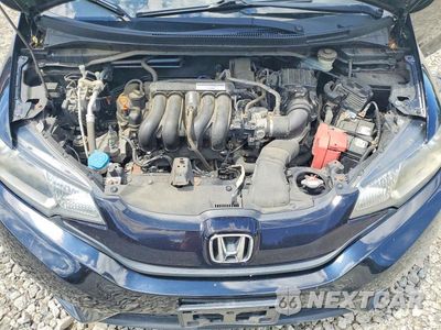 Zdjęcie 11 z 12 samochodu: 2016 HONDA FIT LX VIN:JHMGK5H54GX010858 - miniatura
