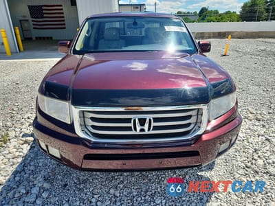 Piąte zdjęcie samochodu w środku: 2013 HONDA RIDGELINE RTL VIN:5FPYK1F50DB014243 - miniatura