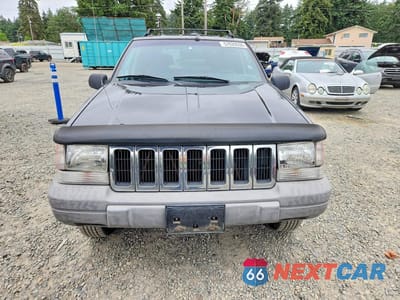 Piąte zdjęcie samochodu w środku: 1998 JEEP GRAND CHEROKEE LAREDO VIN:1J4GZ58SXWC372695 - miniatura