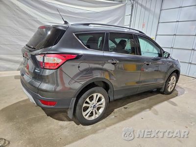 Trzecie zdjęcie samochodu z tyłu: 2018 FORD ESCAPE SEL VIN:1FMCU9HD0JUC92784 - miniatura