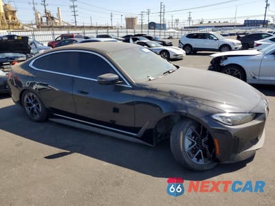 Czwarte zdjęcie samochodu z boku: 2024 BMW I4 EDRIVE 35 VIN:WBY43AW07RFS49281 - miniatura