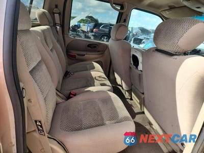Zdjęcie 10 z 12 samochodu: 2002 FORD F150 SUPERCREW VIN:1FTRW07612KB60220 - miniatura