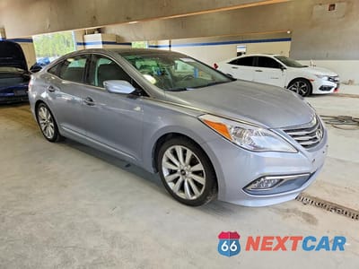 Czwarte zdjęcie samochodu z boku: 2017 HYUNDAI AZERA LIMITED VIN:KMHFH4JG5HA578263 - miniatura