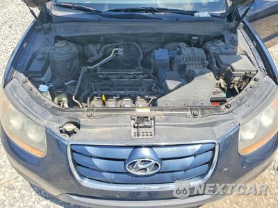 Zdjęcie 12 z 13 samochodu: 2010 HYUNDAI SANTA FE GLS VIN:5NMSG3AB3AH340640 - miniatura