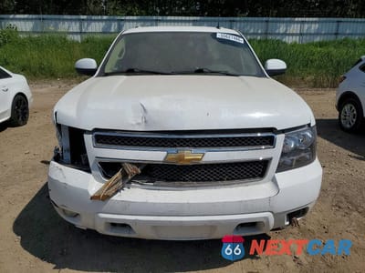 Piąte zdjęcie samochodu w środku: 2010 CHEVROLET SUBURBAN K1500 LT VIN:1GNUKJE35AR188085 - miniatura