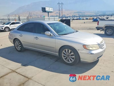 Czwarte zdjęcie samochodu z boku: 2007 HYUNDAI AZERA VIN:KMHFC46F67A190052 - miniatura