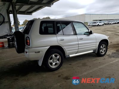 Trzecie zdjęcie samochodu z tyłu: 1999 TOYOTA RAV4 BASE VIN:JT3HP10V7X7135353 - miniatura