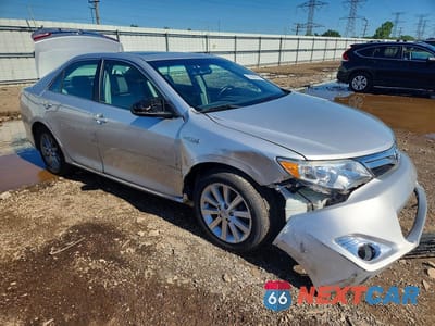 Czwarte zdjęcie samochodu z boku: 2012 TOYOTA CAMRY HYBRID XLE VIN:4T1BD1FK8CU042677 - miniatura
