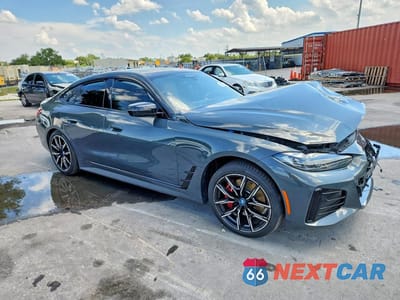 Czwarte zdjęcie samochodu z boku: 2023 BMW I4 EDRIVE 40 VIN:WBY73AW0XPFP87984 - miniatura