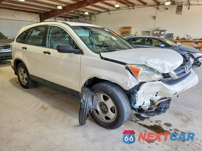 Czwarte zdjęcie samochodu z boku: 2010 HONDA CR-V LX VIN:5J6RE4H34AL072070 - miniatura