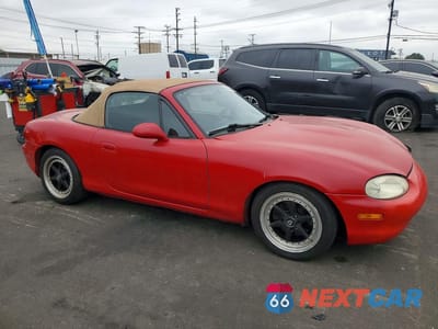 Czwarte zdjęcie samochodu z boku: 1999 MAZDA MX-5 MIATA VIN:JM1NB3532X0100101 - miniatura