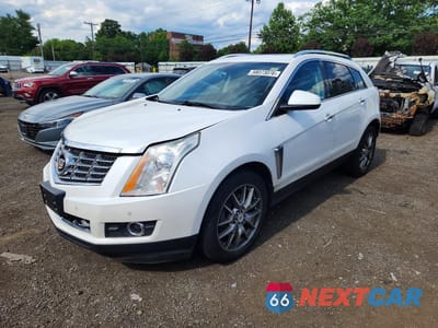 2015 CADILLAC SRX PERFORMANCE COLLECTION 3GYFNFE32FS527079 - główne zdjęcie licytacji z USA - miniatura