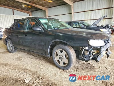 Czwarte zdjęcie samochodu z boku: 2003 CHEVROLET MALIBU LS VIN:1G1NE52J63M619203 - miniatura