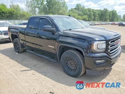 Czwarte zdjęcie samochodu z boku: 2018 GMC SIERRA K1500 SLE VIN:1GTV2MEC1JZ167653 - miniatura