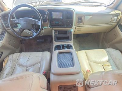 Zdjęcie 8 z 13 samochodu: 2003 GMC YUKON VIN:1GKEC13Z13R229675 - miniatura