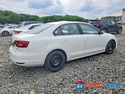 Trzecie zdjęcie samochodu z tyłu: 2017 VOLKSWAGEN JETTA S VIN:3VW2B7AJ3HM203733 - miniatura