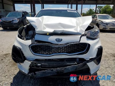 Piąte zdjęcie samochodu w środku: 2021 KIA SPORTAGE LX VIN:KNDPM3AC5M7916361 - miniatura