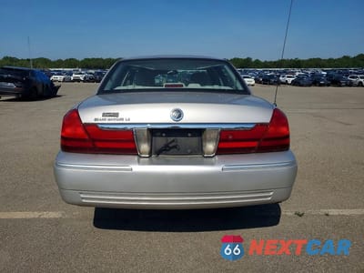 Zdjęcie 6 z 12 samochodu: 2005 MERCURY MARQUIS VIN:2MHHM75W05X625439 - miniatura