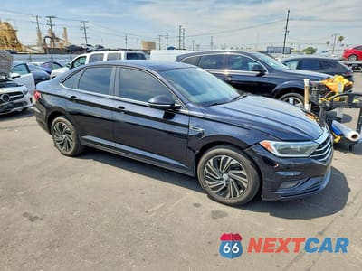 Czwarte zdjęcie samochodu z boku: 2019 VOLKSWAGEN JETTA SEL PREMIUM VIN:3VWG57BU3KM057461 - miniatura