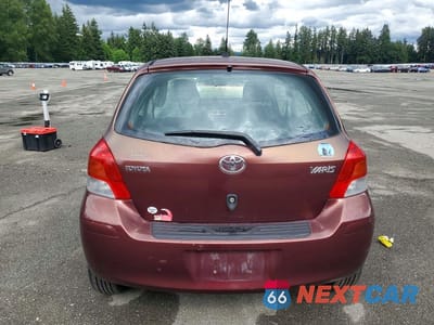 Zdjęcie 6 z 13 samochodu: 2009 TOYOTA YARIS BASE VIN:JTDJT903X95249688 - miniatura