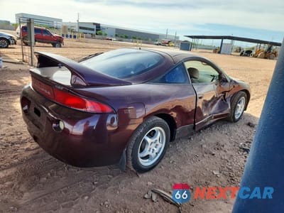 Trzecie zdjęcie samochodu z tyłu: 1997 MITSUBISHI ECLIPSE GST VIN:4A3AK54F4VE057187 - miniatura