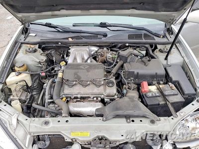 Zdjęcie 11 z 12 samochodu: 2002 TOYOTA CAMRY LE V6 VIN:4T1BF30K32U001399 - miniatura