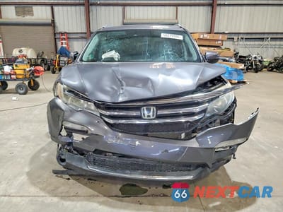 Piąte zdjęcie samochodu w środku: 2016 HONDA PILOT TOURING VIN:5FNYF5H94GB039185 - miniatura