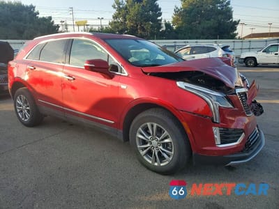 Czwarte zdjęcie samochodu z boku: 2021 CADILLAC XT5 PREMIUM LUXURY VIN:1GYKNDRS9MZ108120 - miniatura