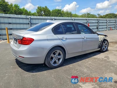 Trzecie zdjęcie samochodu z tyłu: 2015 BMW 320 I VIN:WBA3B1G52FNT05667 - miniatura