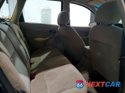 Zdjęcie 10 z 12 samochodu: 2001 FORD FOCUS SE VIN:1FAFP36371W254303 - miniatura