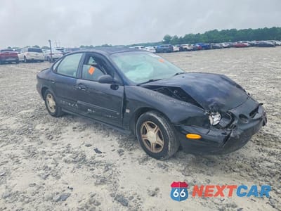 Czwarte zdjęcie samochodu z boku: 1999 FORD TAURUS SE VIN:1FAFP53S2XA169429 - miniatura