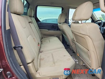 Zdjęcie 10 z 12 samochodu: 2011 HONDA RIDGELINE RT VIN:5FPYK1F25BB003581 - miniatura