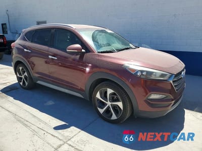 Czwarte zdjęcie samochodu z boku: 2017 HYUNDAI TUCSON LIMITED VIN:KM8J3CA23HU475221 - miniatura