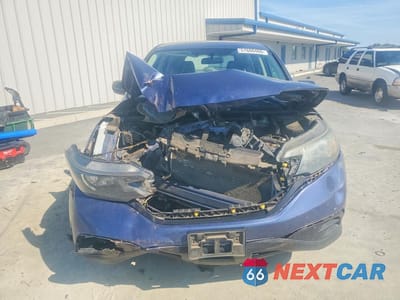 Piąte zdjęcie samochodu w środku: 2014 HONDA CR-V LX VIN:2HKRM4H39EH606117 - miniatura